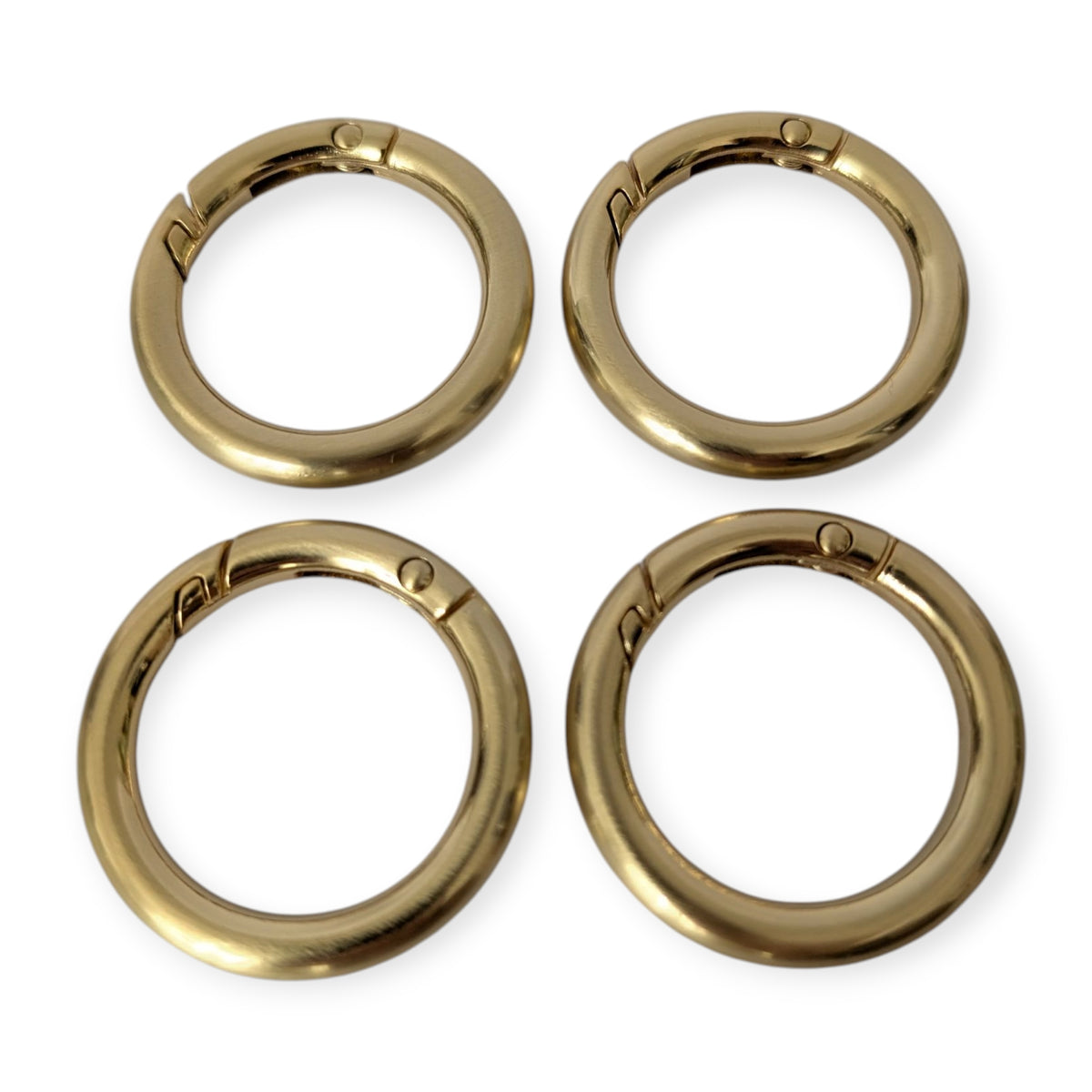 Karabinerringe Gold